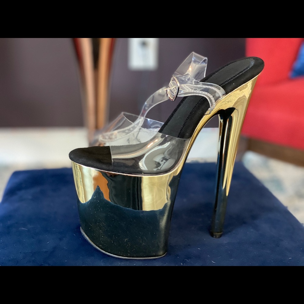 Gold platform stilettos.